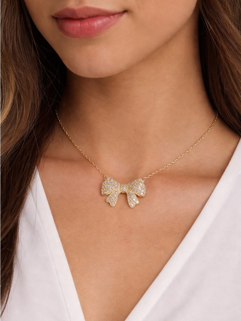 Krista gold bow Kendra Scott necklace